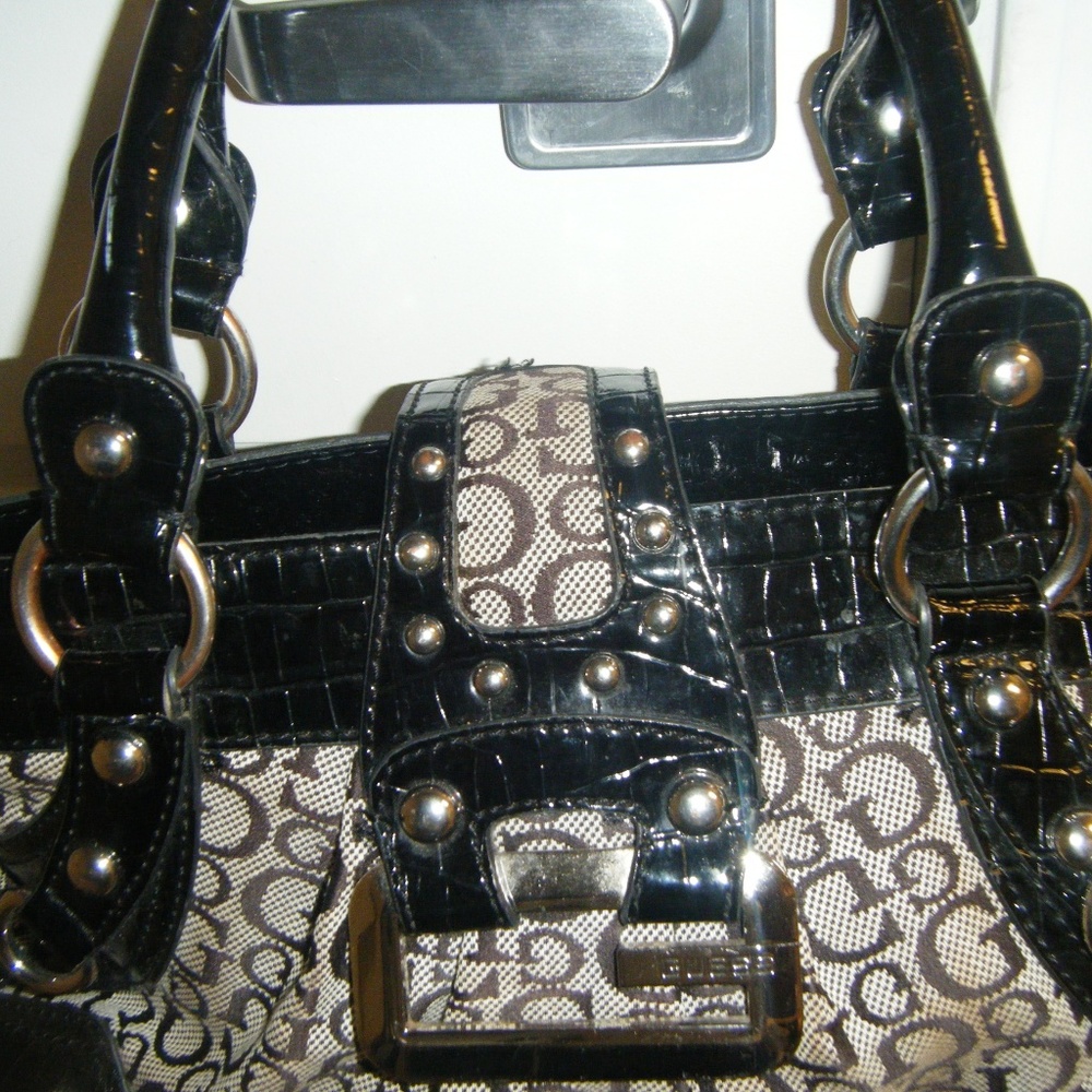 Guess Purse measured 14" W X 9"H